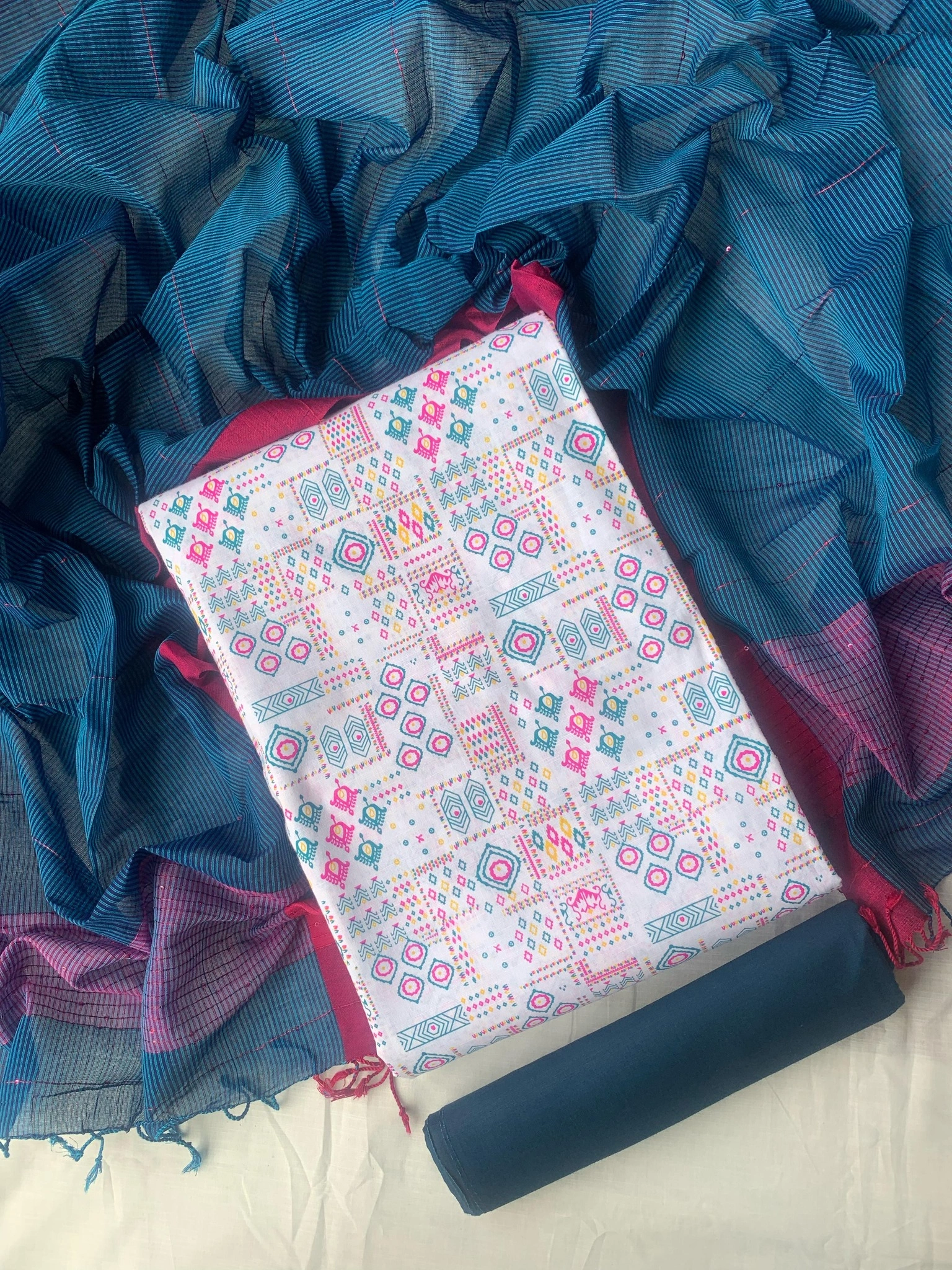 Unstitched Slub cotton three-piece.